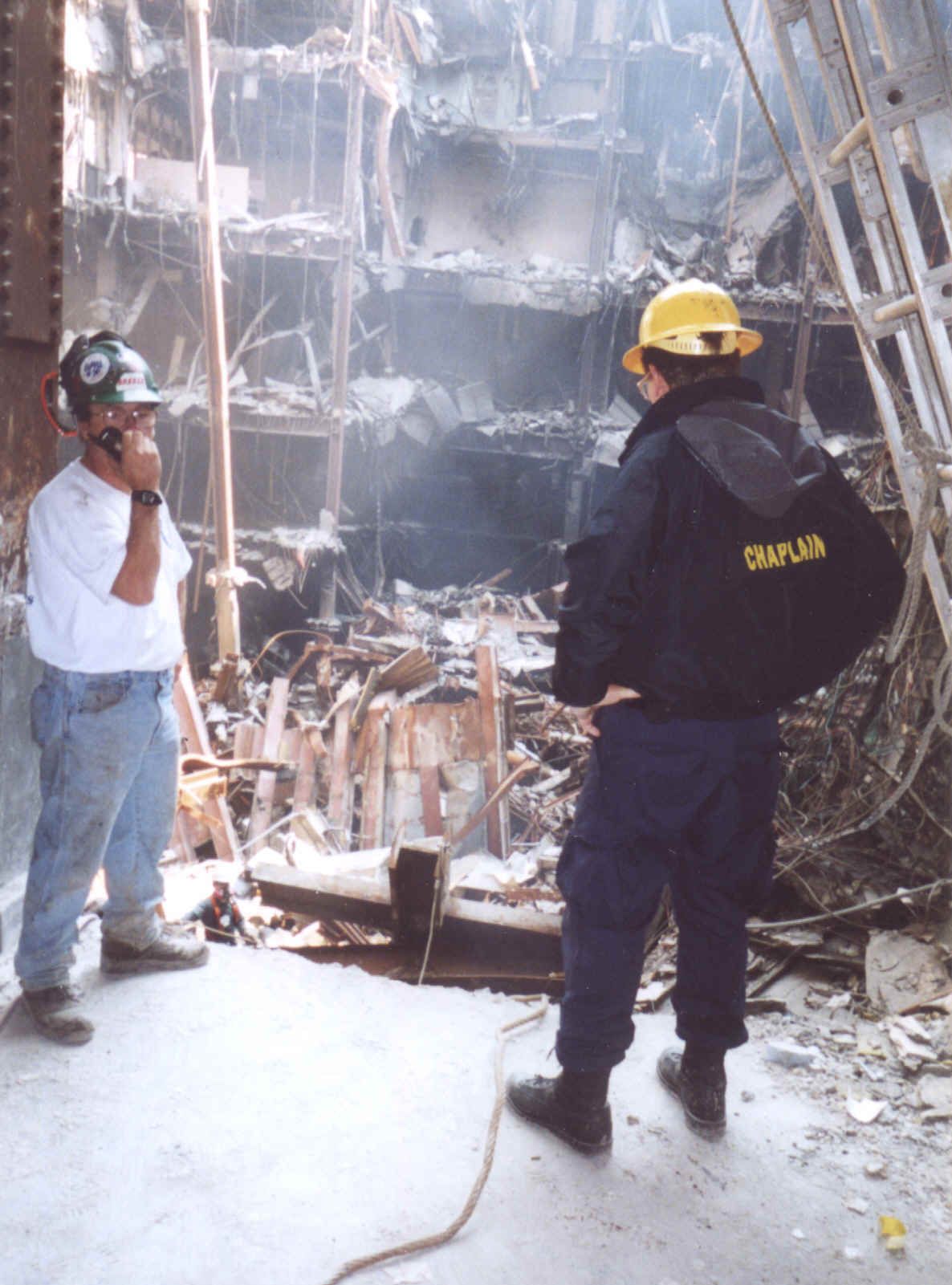 9/11 Chaplain Steve Lee with Ground Zero Cross Recovery Crew Foreman Danny Collins in Building 6 of the NY World Trade Center.